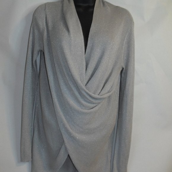 Jennifer Lopez Glimmery Silver low cut mini dress - Picture 1 of 4